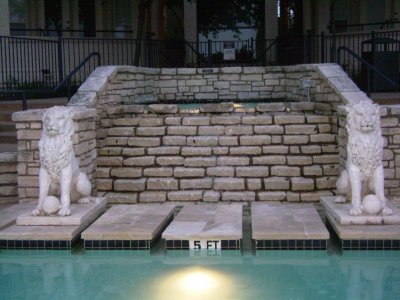 The area behind that brick wall between the lions was another small pool, but I didn't see jets so don't know if it was a second Jacuzzi by the big pool or just a splash spot.  However, what's hard to see in this picture is that it created a waterfall over the brick wall, down into big pool.