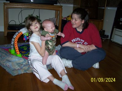 Big sister, Gracie, who's 7 years old, gets to interact with her baby brother with Mommy close by to step in if needed.