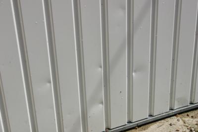 hail storm damage ~3~ garage door