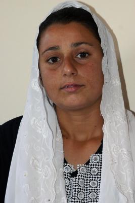 Woman with white headscarf