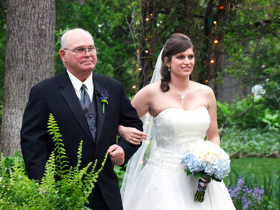 Crystal's dad Clyde Boyer escorting beautiful bride Crystal to the altar