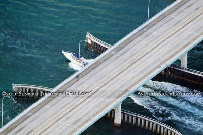 2011 - speedboat going out of Haulover Inlet under the A1A bridge