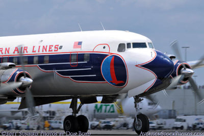 The Historical Flight Foundation's restored Eastern Air Lines DC-7B N836D landing at MIA aviation stock photo