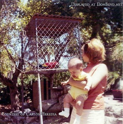 1968 - Carlos Heredia with his mom Inelda Heredia at one of the bird cages at the Crandon Park Zoo which many of us loved