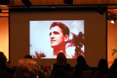 Guests watching the Dick Judy family's video of old photos during the Dick Judy Celebration of Life luncheon