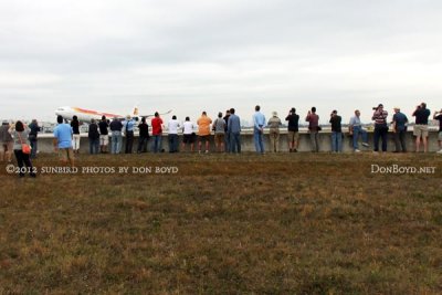 2012 MIA Airfield Tour - tour group photographing Iberia A-340 landing on runway 30