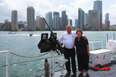 April 2012 - Don and Karen next to one of four M2HB .50 caliber machine guns on the newly commissioned USCGC BERNARD C. WEBBER