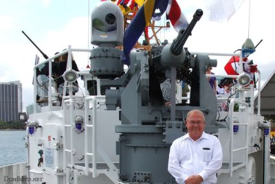 April 2012 - Don Boyd standing under the M242 Bushmaster 25 mm (25137mm) chain-fed autocannon on the USCGC BERNARD C. WEBBER