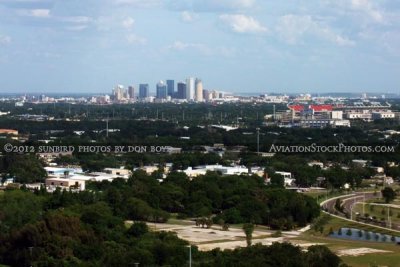 May 2012 - looking east across Tampa towards downtown Tampa and Raymond James Stadium on the right aerial stock photo