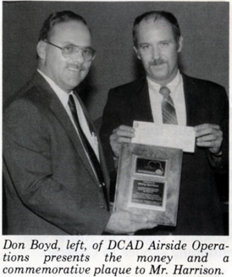 1989 - Don Boyd awarding a plaque and check to Mr. Ken Harrison, an airline employee, for a beneficial suggestion to the airport