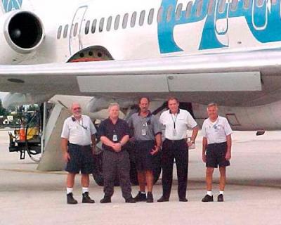 2003 - United's Mike Maynard (2nd from right) and co-workers (all ex-Pan Amer's) on the ramp