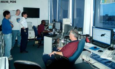 2006 - Photogs Ben Wang and Joe Pries with Senior Agent Fernando Bernal and Gate Controllers Derrick Douglas and Al Rodriguez