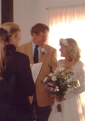 Gretchen Abernathy, Dennis and Brenda during the marriage ceremony