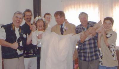 Mark, Bill, Justin, Dennis, Paul and Zander holding Brenda up