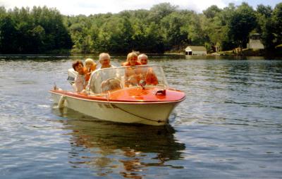 Early 70's - John M. C. Boyd (far right) in the Hendersons' boat on Upper Rideau Lake