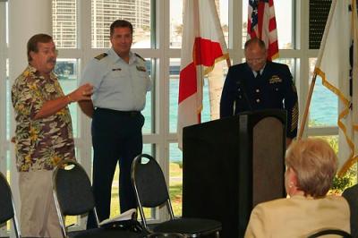 CAPT Dick Walde (left) USCGR-Ret. speaking at BMCM Paul DeBold's retirement ceremony