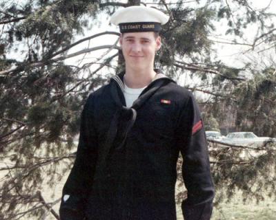 1967 - FA Dennis (Mike) Treston, USCG, modeling the new Coast Guard hat