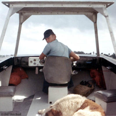 1967 - SN Dan Yurcik, USCG and Buster on TICWAN boat