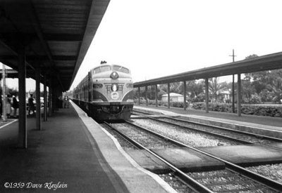 1959 - FEC train boarding passengers at the North Miami station
