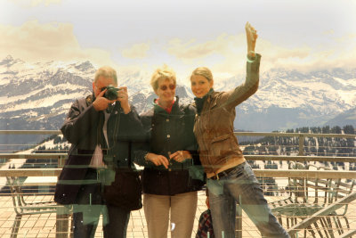 Reflection of Ralph, Maria and Sandra on the Rigi