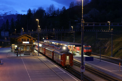 Night falls over Filisur Station on the Albula line....