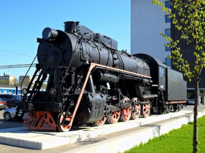 OLD STEAM ENGINE OUTSIDE THE RAILWAY STATION