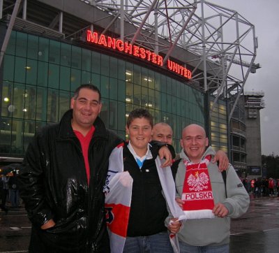 John & Kieran with cheery Poland supporters at Old Trafford