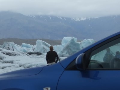 Man, ice and car