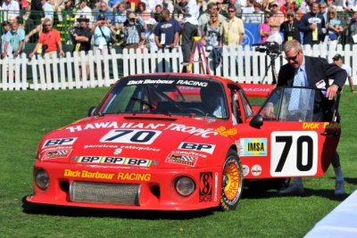 Porsche, with race car driver Hurley Haywood standing next to it (8289)