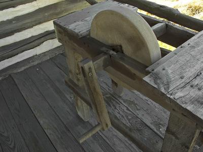 Grinding Stone outside the Wiley Cabin
