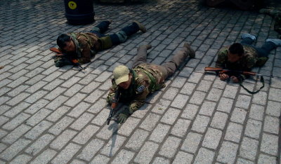 One-Zero demonstrating to the team