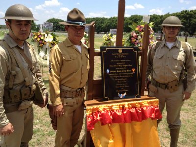 With the commemorative plaque from the Philippine Scout Heritage Society