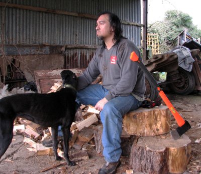 Ciaragh is helping me chop some wood at the Greyhound Rescue