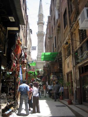 cairo bazaar with minaret in background