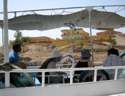 nubian houses in background, seen on boat from philae