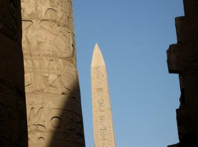 obelisk of hatshepsut and pillars at karnak