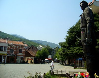 KLA statue overlooking main square, prizren