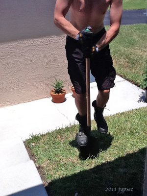 mike digs up the lawn