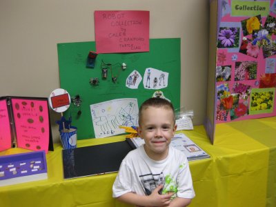 Proud Scientist and His Exhibit