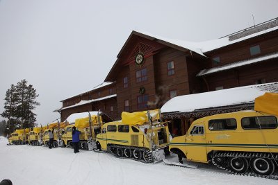 Snow coaches in front of the lodge