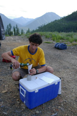 Scott 'filtering' his scotch into a flask