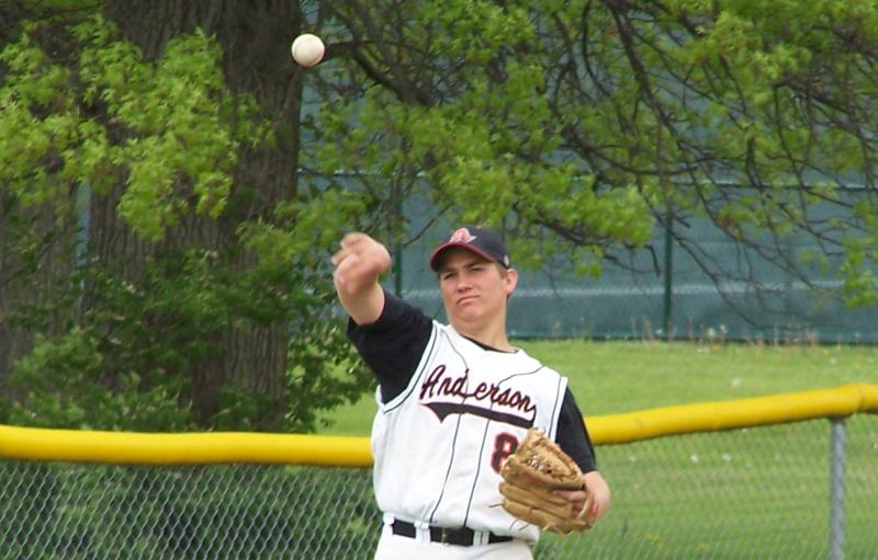 justin s. makes the throw from third