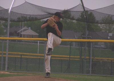 adam pitching at dusk