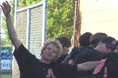 happy kid in the dugout