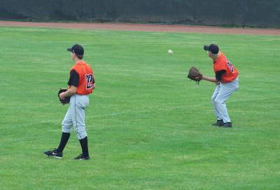 #22 and #23 warming up the outfielders