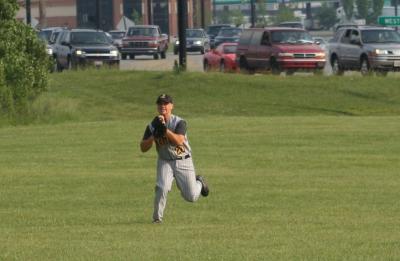 nick makes a catch in left field