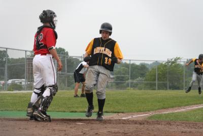 micah crosses the plate