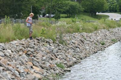 adam fishing near the dam