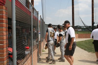 into the dugout to pick  names out of a hat for game 2