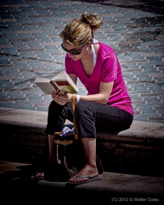 Girl reading HB PierNicholas Sparks.jpg